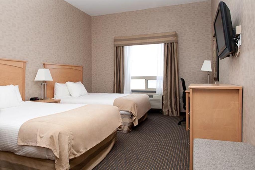 Paradise Inn And Suites Valleyview Стая снимка