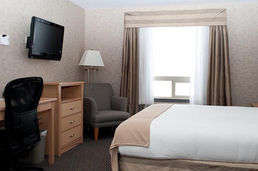 Paradise Inn And Suites Valleyview Стая снимка